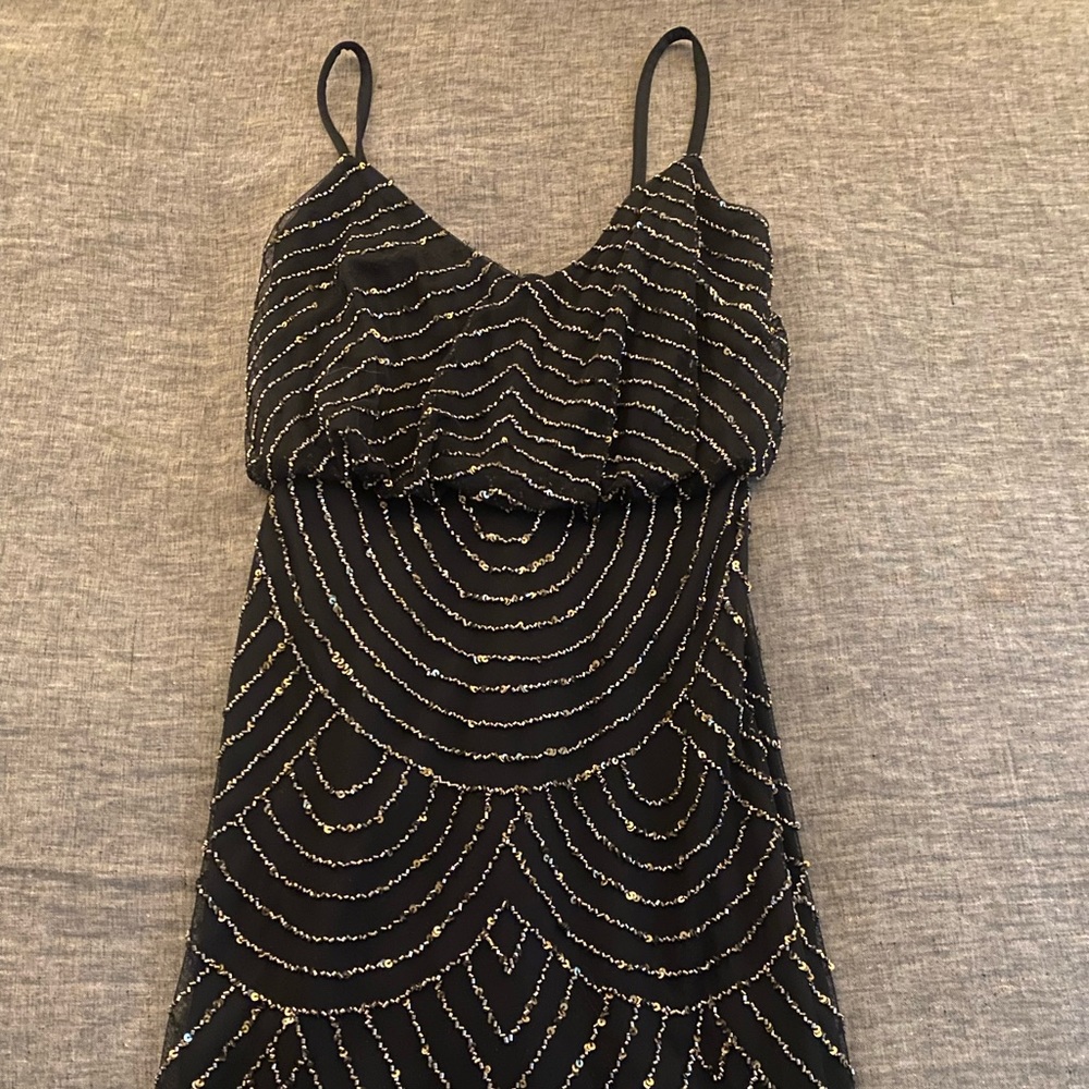 Black gold sequenced cocktail dress